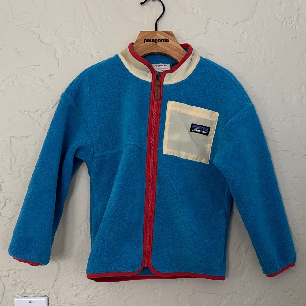 Patagonia blue fleece jacket with red and cream accents size 5T barely worn